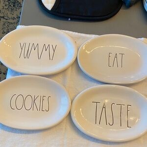 Rae Dunn set of 6 plates.